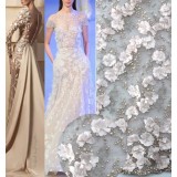 Three dimensional embroidered lace fabric